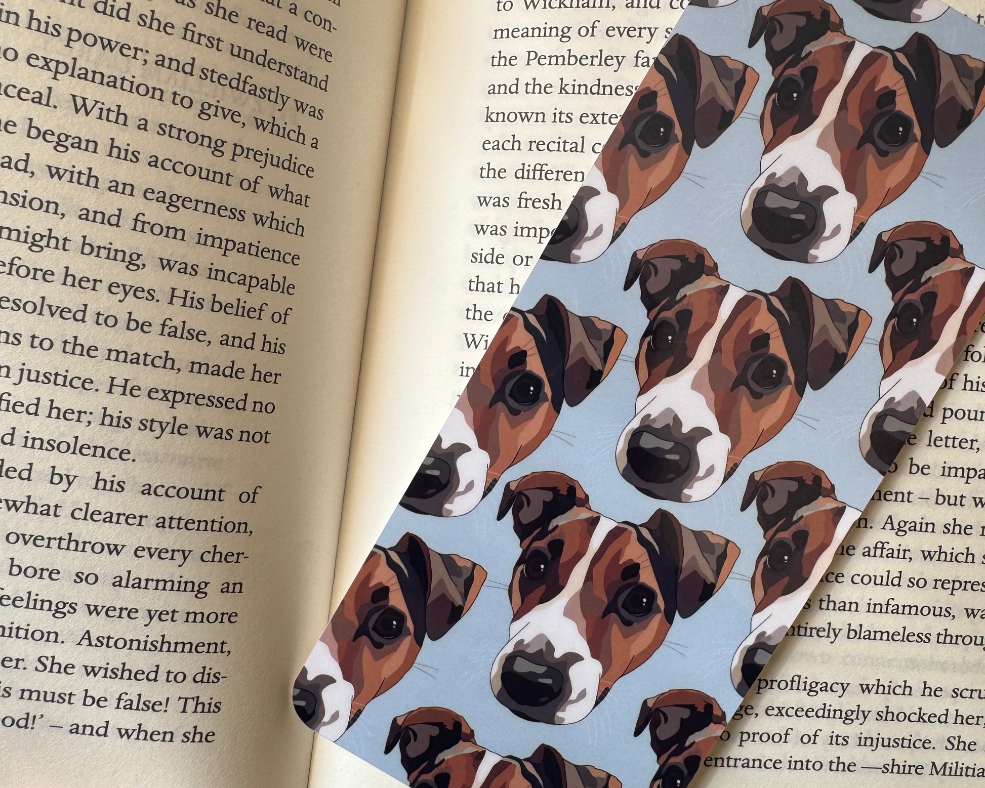 Book with a pattern of dog faces on a blue background